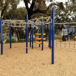 blue and yellow playground equipment in North Florida | creativerecproducts.com