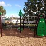 brown and green playground equipment | creativerecproducts.com