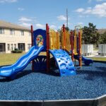 Blue rubber mulch in Central Florida safe play zone